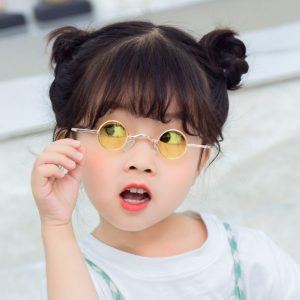 Vintage round kids size sunglasses with golden metal frame with multiple color